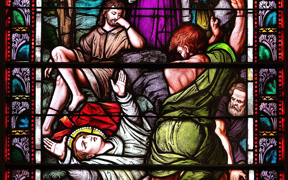 A stained-glass image at Good Shepherd Church in Chilton, Wis., depicts the martyrdom of St. Stephen, the first deacon, by stoning. The feast of St. Stephen the Martyr is Dec. 26. (OSV News photo/Sam Lucero)