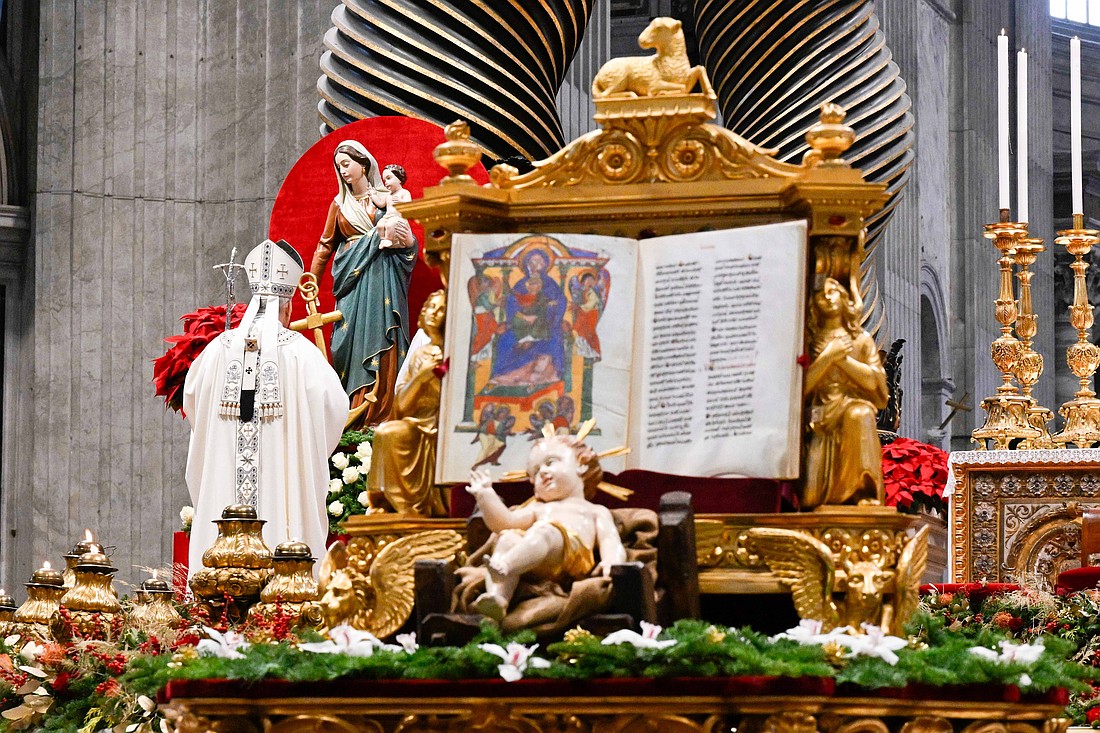Pope Leo XIV prays before a statue of Our Lady of Hope and the Christ child during Mass for the feast of Mary, Mother of God, and World Peace Day in St. Peter’s Basilica at the Vatican Jan. 1, 2026. (CNS photo/Vatican Media)