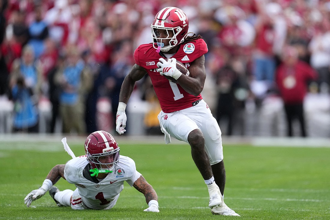 Indiana Hoosiers running back Roman Hemby (1) runs against Alabama Crimson Tide defensive back Domani Jackson (1) in the first half of the 2026 Rose Bowl and quarterfinal game of the College Football Playoff on New Year's Day at Rose Bowl Stadium in Pasadena, Calif. The Hosiers defeated Alabama 38-3. (OSV News photo/Mandatory Credit: (OSV News photo/Kirby Lee-Imagn Images via Reuters)