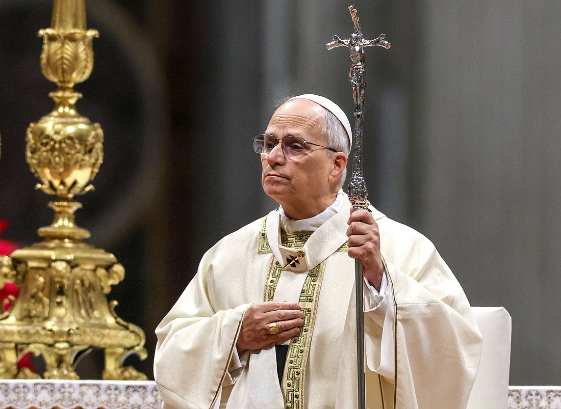 Pope Leo XIV holds his pastoral staff as he celebrates Mass on the feast of the Epiphany in St. Peter's Basilica at the Vatican Jan. 6, 2026. (OSV News photo/Yara Nardi, Reuters)..