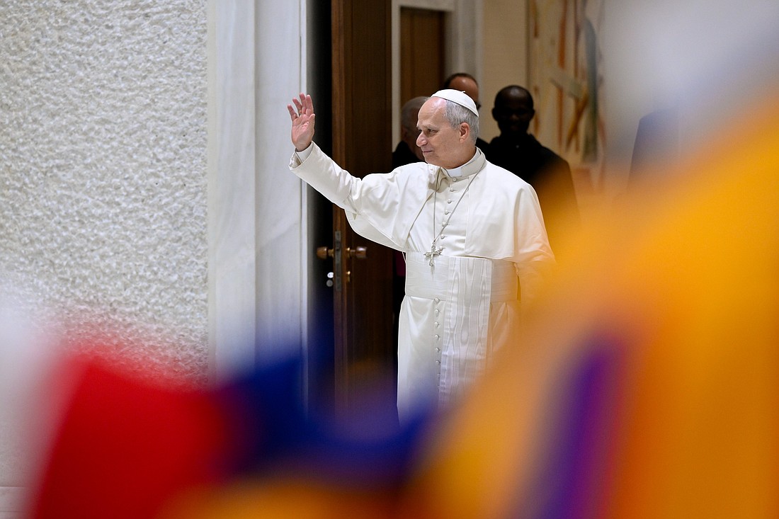 Pope Leo XIV greets people at the beginning of his weekly general audience in the Paul VI Audience Hall at the Vatican Jan. 14, 2026. (CNS photo/Vatican Media)