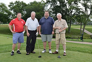 Golf outing raises funds for retired priests