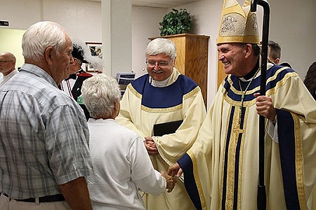 Bishop O'Connell installs Father Blanchett as pastor of Visitation Parish