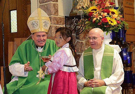 Triple Blessing -- Tri-Community Mass celebrates beauty of cultures joining together in faith