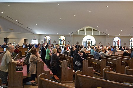 Sacraments key to building faith in family life, speaker tells catechists