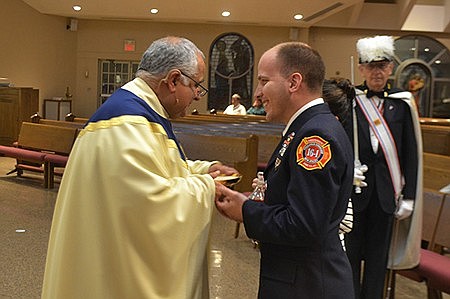 Shining a light in the midst of darkness --  Faithful gather to pray for peace in Freehold church