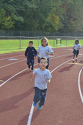 Students walk, play to raise funds for school