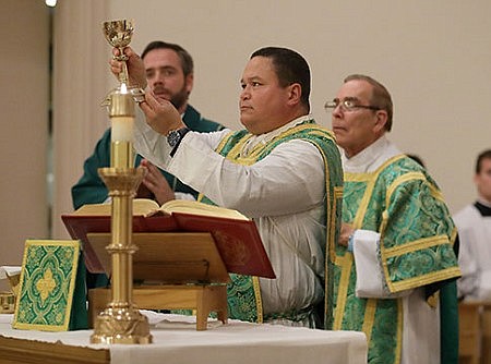 Father Wallack and team planning vocations awareness outreach efforts