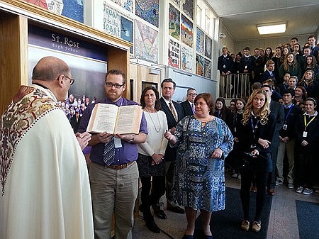  Donors cut ribbon for St. Rose High School's new library