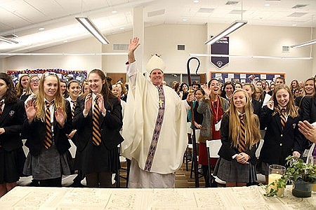Bishop O'Connell bestows Advent blessings during first visit to Trinity Hall