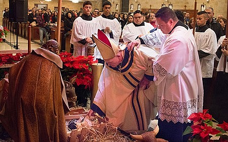 At Christmas Vigil Mass, Bishop reminds faithful that the Christmas story is worth repeating