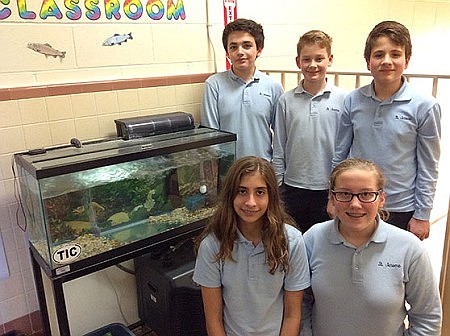 Young conservationists in St. Jerome School aid fish population  