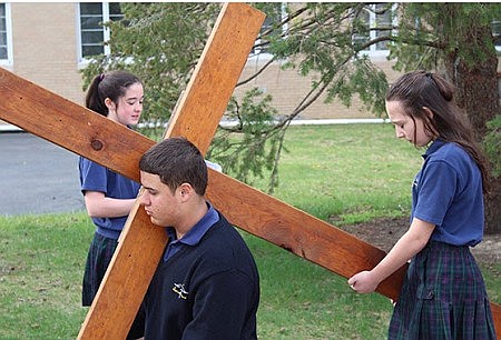 St. Raphael students re-enact Triduum during retreat