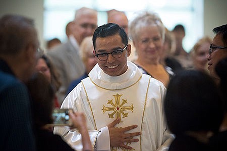 With the People: For Father Abadilla, being present, showing compassion are hallmarks of priesthood