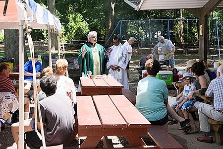 After merger, parishioners from Sacred Heart Parish, Trenton, come together in prayer, fellowship