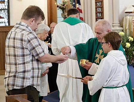 Following God's Plan -- Newly retired Father Venza has 45 years  of pleasant memories of priesthood 