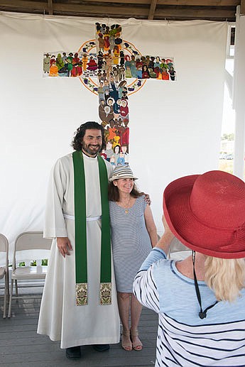 Vision for banner displayed during Belmar gazebo Mass shows Jesus surrounded by many