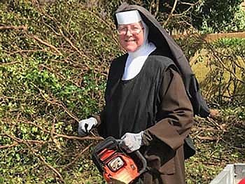SUBSCRIBER EXCLUSIVE: Carmelite sister becomes sensation after cleaning up from Irma with chainsaw
