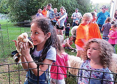 Story of Creation, farm animals delight youngsters in Medford