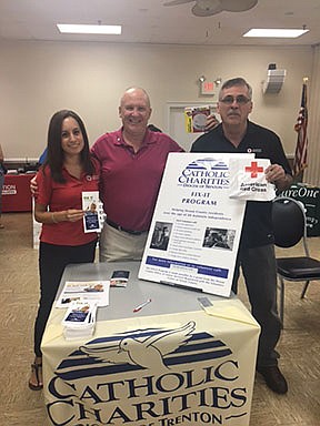 Catholic Charities and American Red Cross partner to install more than 300 smoke alarms