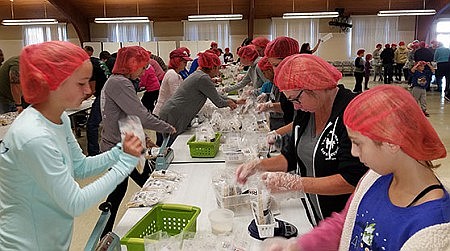 St. Dominic Parish assembles meals for world's hungry