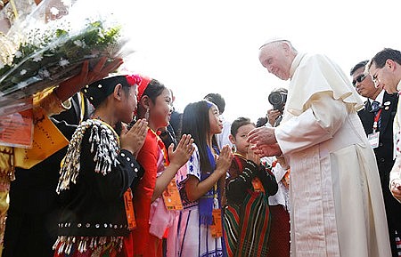Pope meets generals after brief welcome by children in Myanmar 