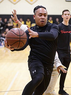 Priests take to the basketball court to teach about vocations