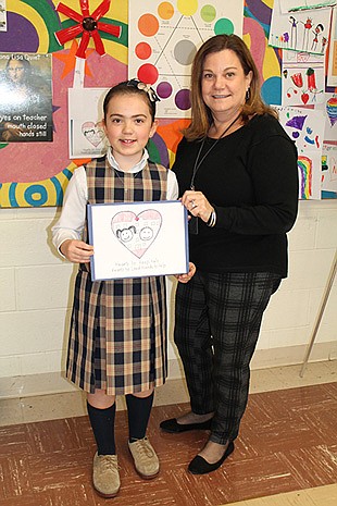 St. Benedict School third-grader designs logo for diocesan Day of Service