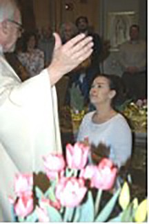 One Baptism leads to another for young mother