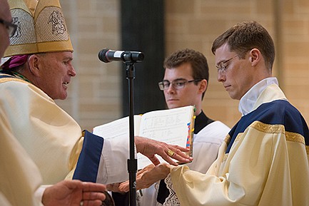 Family Matters -- Father DeSaye looking forward to being  a shepherd to all God's children 