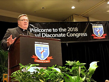 Cardinal says deacons' life of action, charity, service models Jesus' life