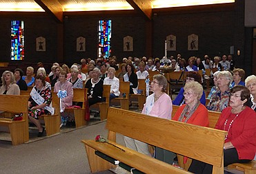 Bishop O'Connell celebrates with Altar Rosary Network 