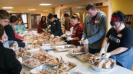 Brick parishioners expand Thanksgiving meal assistance, drive to hundreds of homes