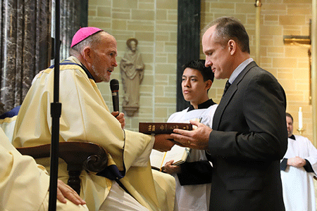 Candidates installed as lectors, acolytes as part of permanent diaconate process