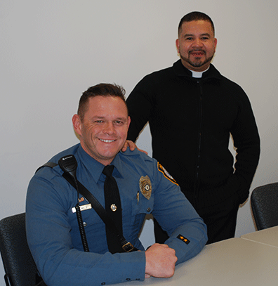 Priest, police help save a life through collaboration