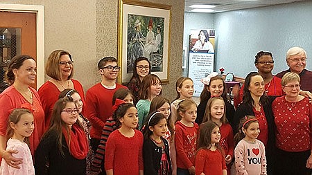 Youngsters from Brick parish delight seniors with sweet, musical Valentines treat