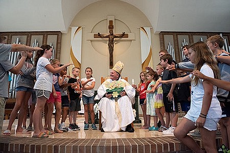 Summer religious education programs draw Bishop to Toms River, Holmdel