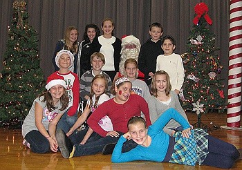 St. Raphael School welcomes Santa