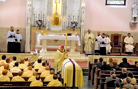 Msgr. Smith recalled for his abiding faith, good humor and gift of song