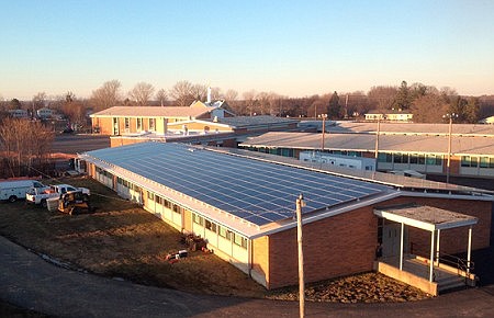 Parish, school cut ribbons on solar farms