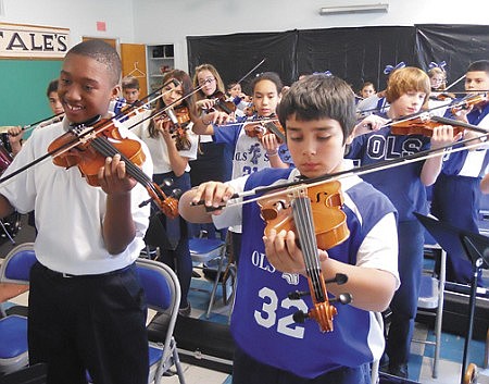 Catholic schools share gift of music with students