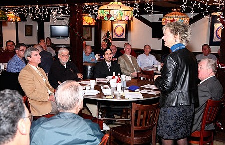 Men's breakfast group hosts Catholic Charities