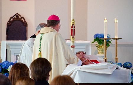 'Father John's smile' and love of family recalled