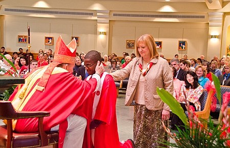 Confirmed by bishop, young adoptee celebrates faith, family