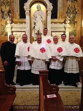 Six priests honored with investiture into the Order of the Holy Sepulchre