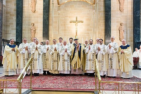 In solemn ceremony, Bishop O'Connell ordains 13 permanent deacons