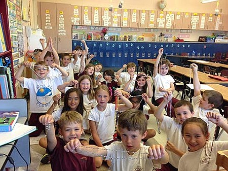 First graders learn to pray the Rosary 