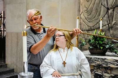 SUBSCRIBER EXCLUSIVE -- Ohio teen with Down syndrome on journey to serve at Mass in 50 states 