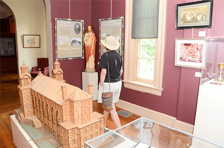 Museum exhibit showcases origins of city's Catholicism 