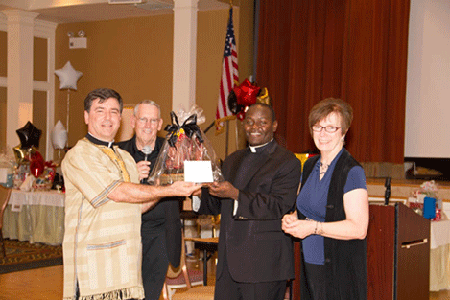 Father Bambrick honored for longtime ministry to Ugandan people 